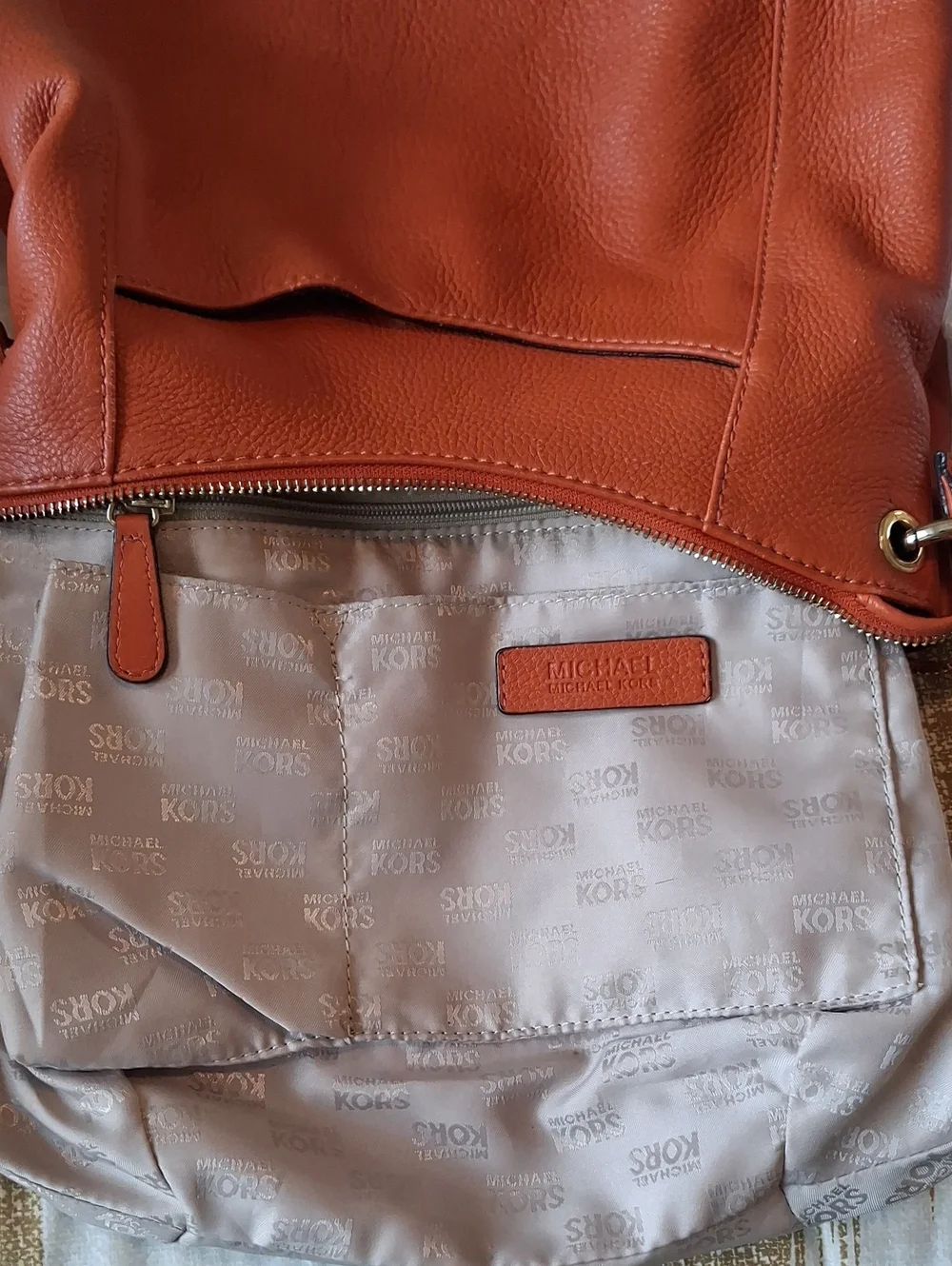 Michael Kors Orange Pebbled Leather Convertible Hobo Bag